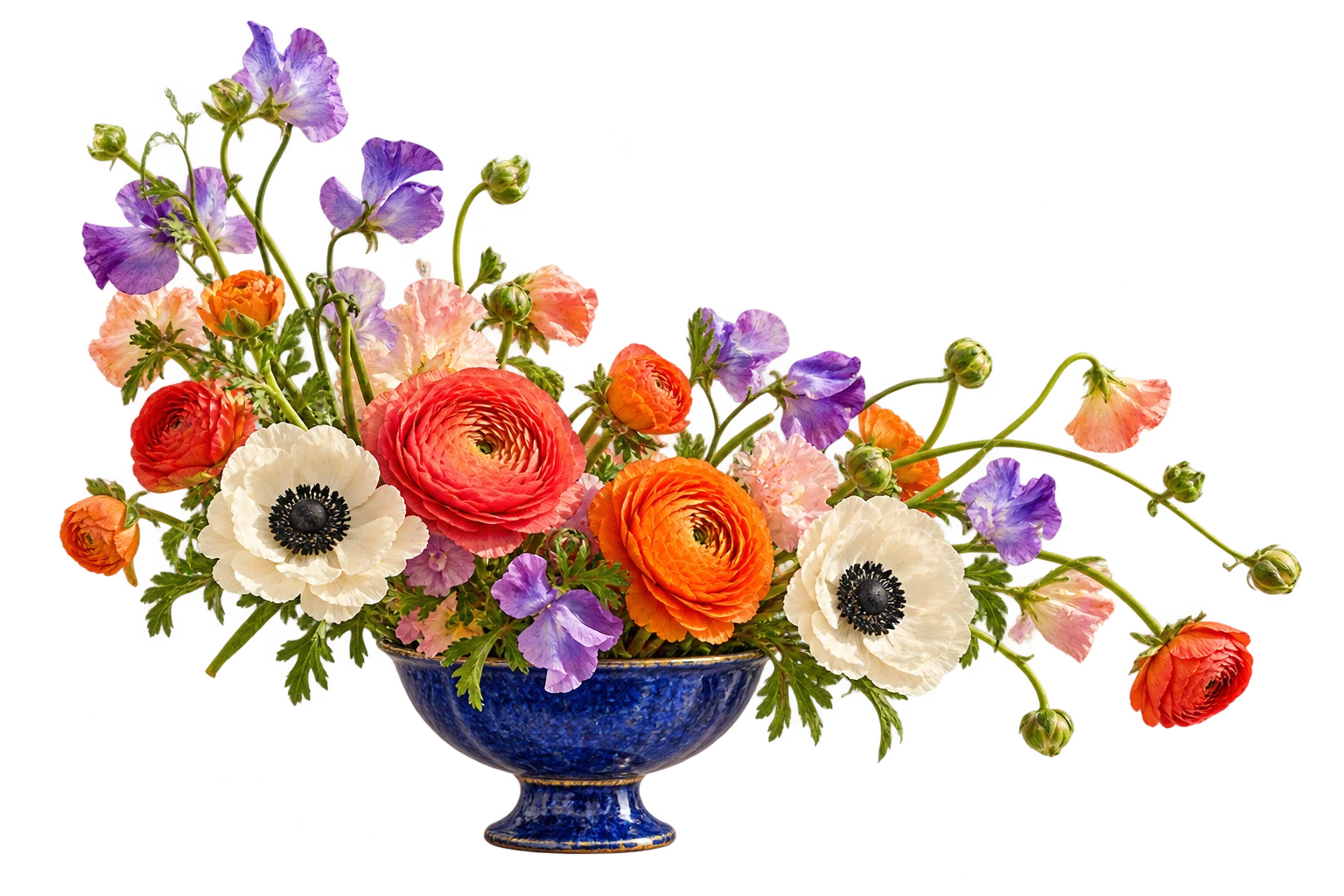 Airy coral, cream and violet flowers arranged in a cobalt ceramic footed bowl