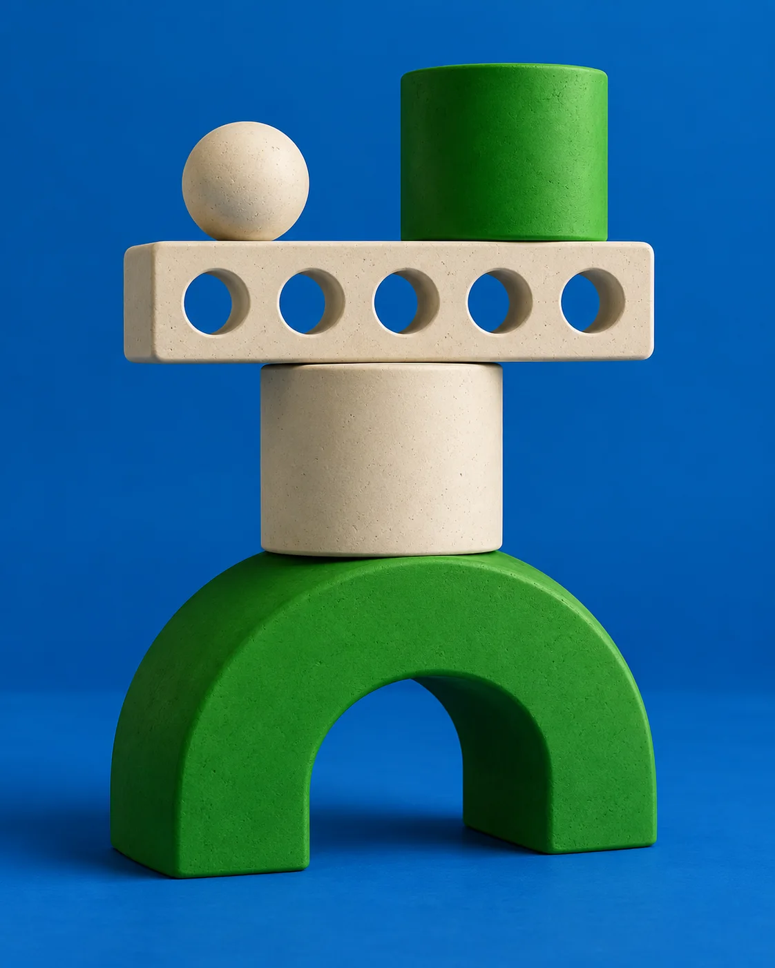 Illustrative sculptural arrangement of blue, green and pale modular forms.