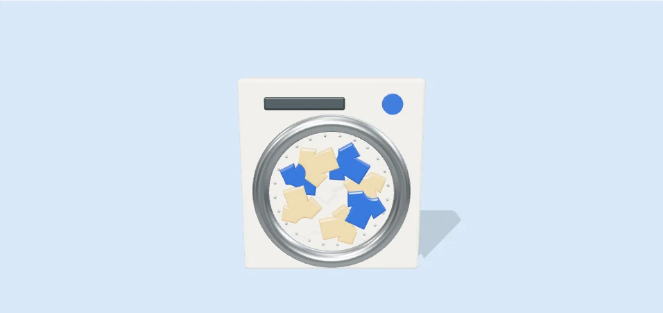 A stylized washing machine with a spinning drum and colorful laundry. Select Play to interact.